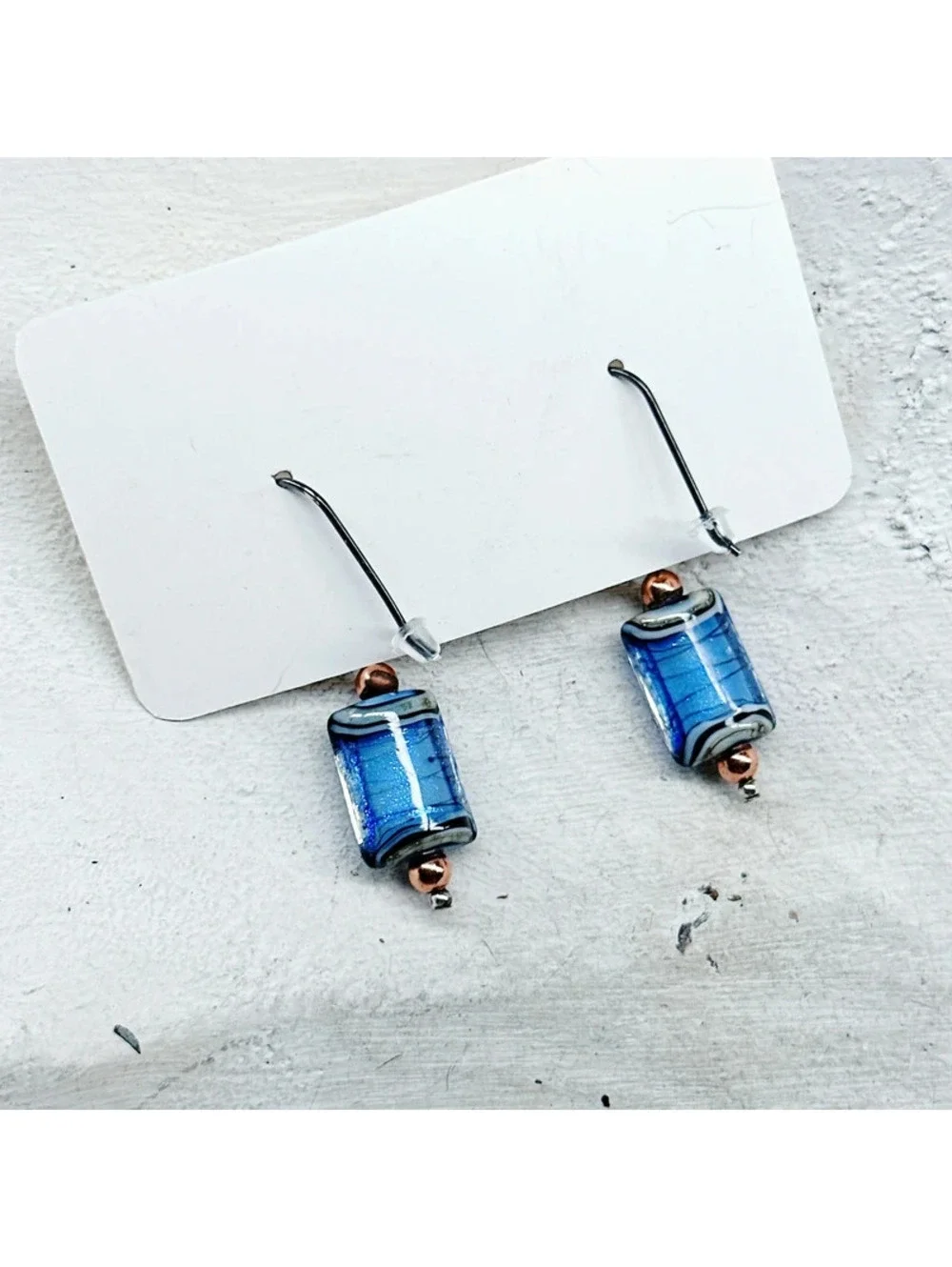 1058mc. Ribbon Blue Glass Earrings
